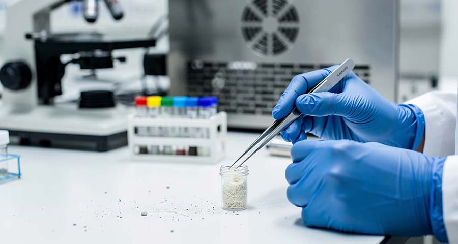 Asbestos bulk sample being prepared for analysis at a UKAS-accredited laboratory serving Birmingham