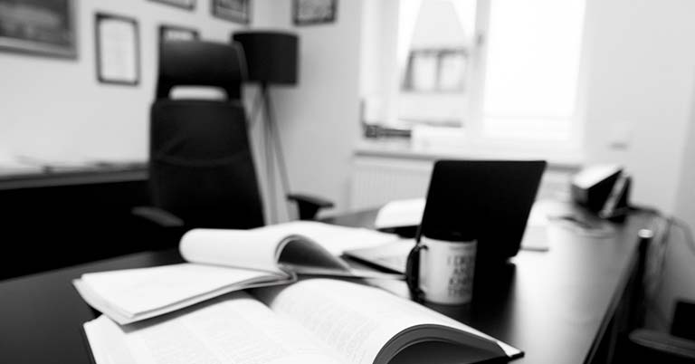 office with books, desk and chair