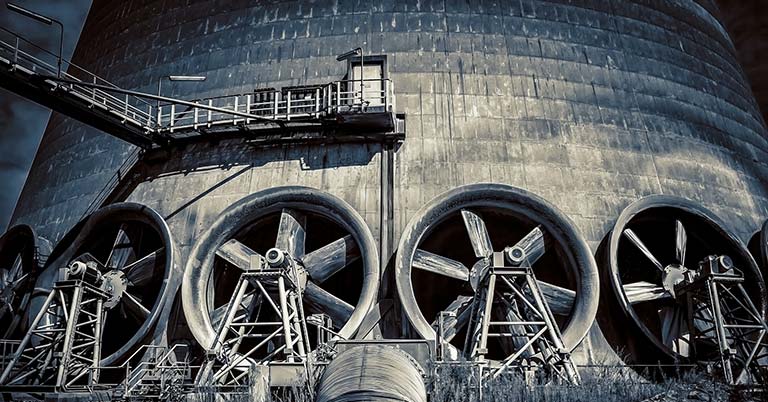 industial picture with fans and a cooling tower